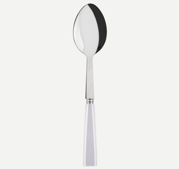 The Sabre Icone White Serving Spoon features a shiny, stainless steel bowl and a straight white handle, shown against a plain white background.