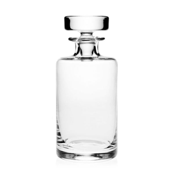 The William Yeoward Lillian Spirit Decanter is a clear handmade crystal decanter with a stopper, ideal for showcasing your favorite spirits, displayed against a white background.