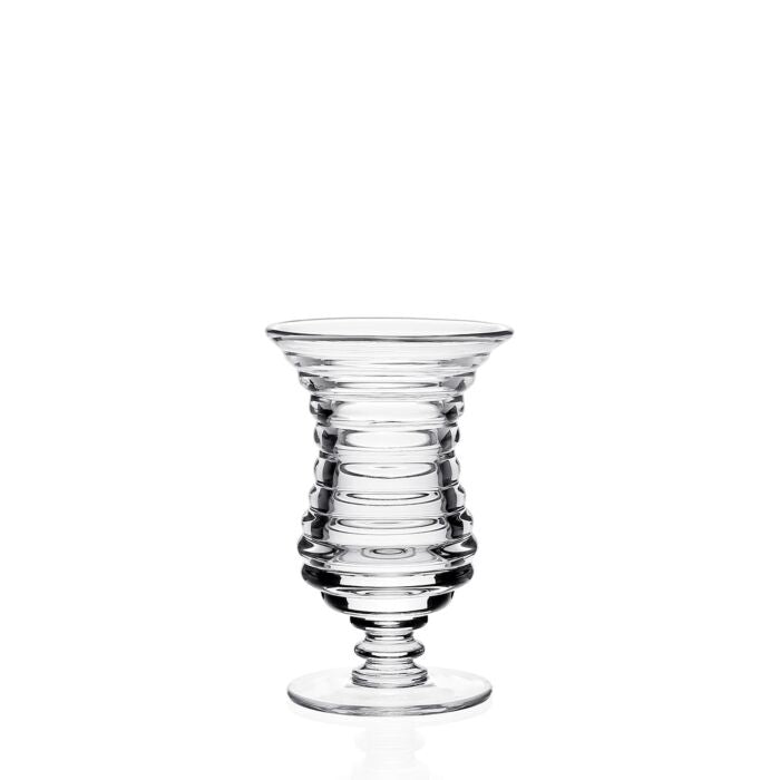 The Ripples Footed Vase by William Yeoward features clear glass with horizontal ridges, a flared rim, narrow neck, and round base. Its modern design is perfect for flower arrangements. Shown against a plain white background.