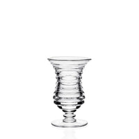 The Ripples Footed Vase by William Yeoward features clear glass with horizontal ridges, a flared rim, narrow neck, and round base. Its modern design is perfect for flower arrangements. Shown against a plain white background.