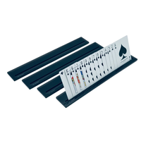 Four Luxe Dominoes Luxe Canasta & More black card racks, designed as organizers, display a full suit of spades from ace to king against a white background.