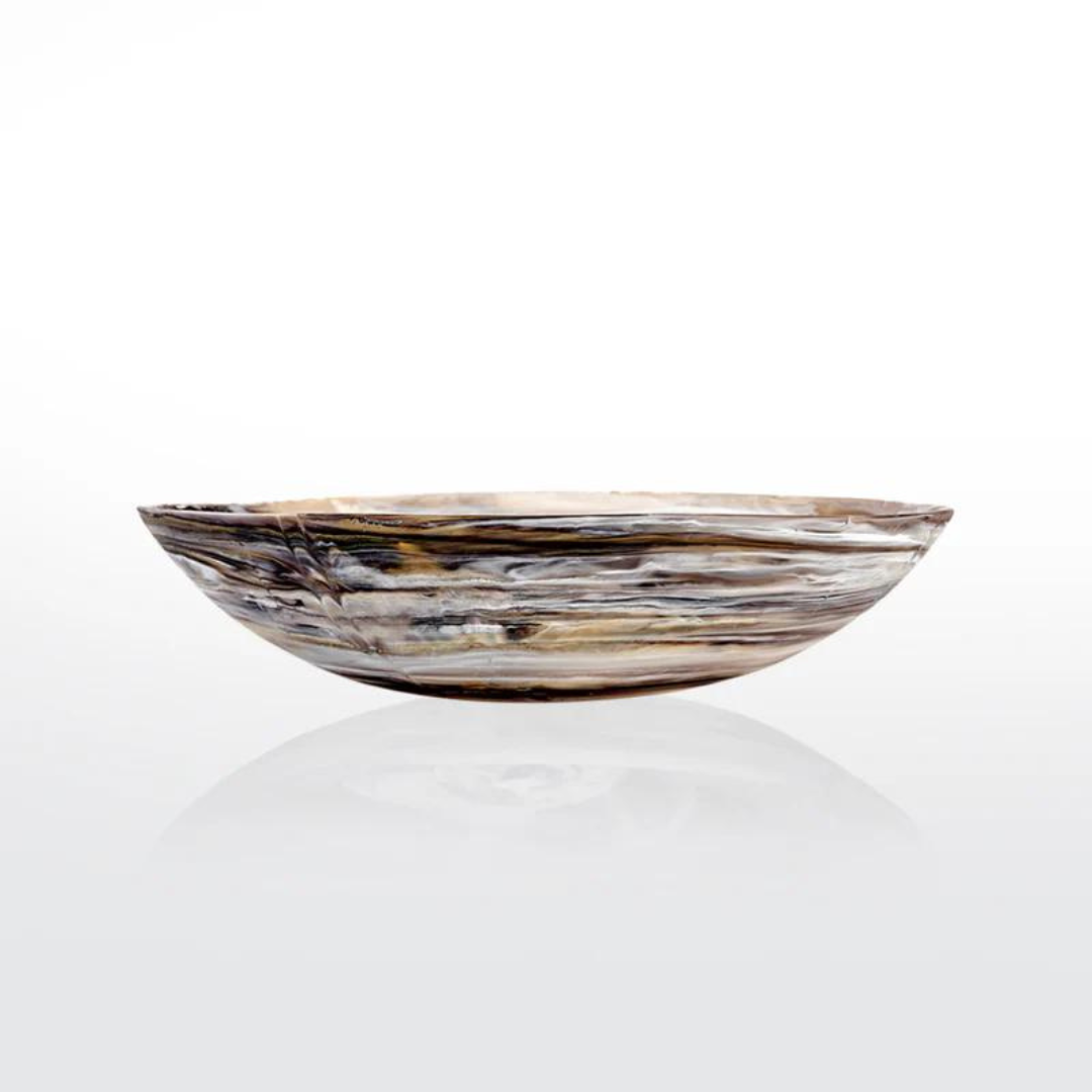 The Swirl Colored Resin Everyday Bowl by Nashi Home features a marbled mix of brown, beige, and cream. Made from shatterproof resin, it's ideal for handcrafted home decor and adds elegance to any setting.