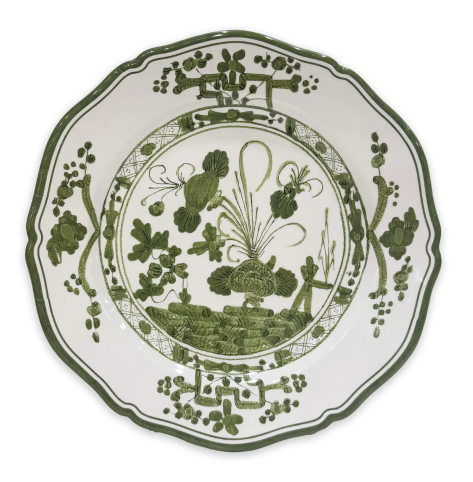 The Beatriz Ball Vida Faenza Melamine Dinnerware Green White Set of 4 features decorative round plates with scalloped edges and an intricate green floral-botanical design on a white background.
