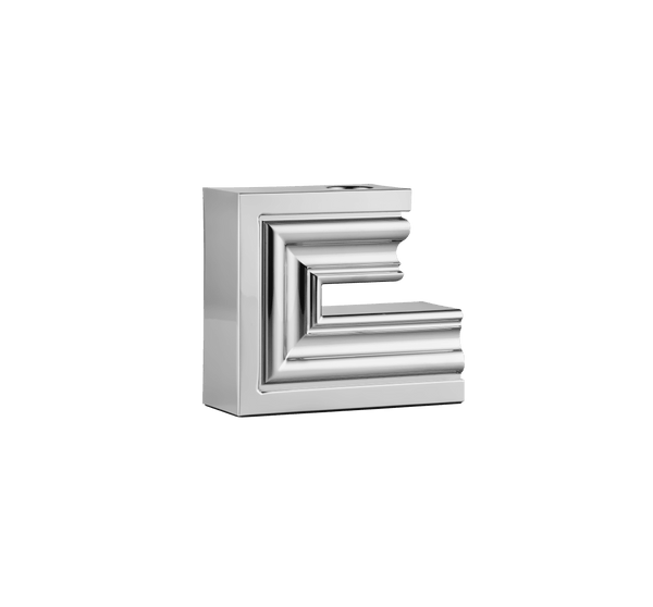 The Perspectives Chrome Candle Holder Large by Christofle features bold geometric lines and a reflective chrome finish. This modern decorative piece stands out against a plain white background, making it a stunning contemporary centerpiece.