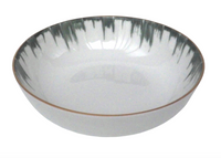 The Marie Daâge Iris 2 Dinnerware by Marie Daâge features a round ceramic bowl with a glossy white interior, green and gray brushstroke rim, and thin brown edge, reflecting hand-painted porcelain artistry and luxury tableware design.