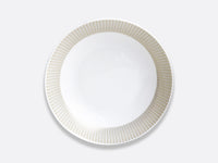 The Sol Dinnerware plate by Bernardaud is made of white Limoges porcelain with evenly spaced thin gold lines around the rim, displayed on a light gray background.