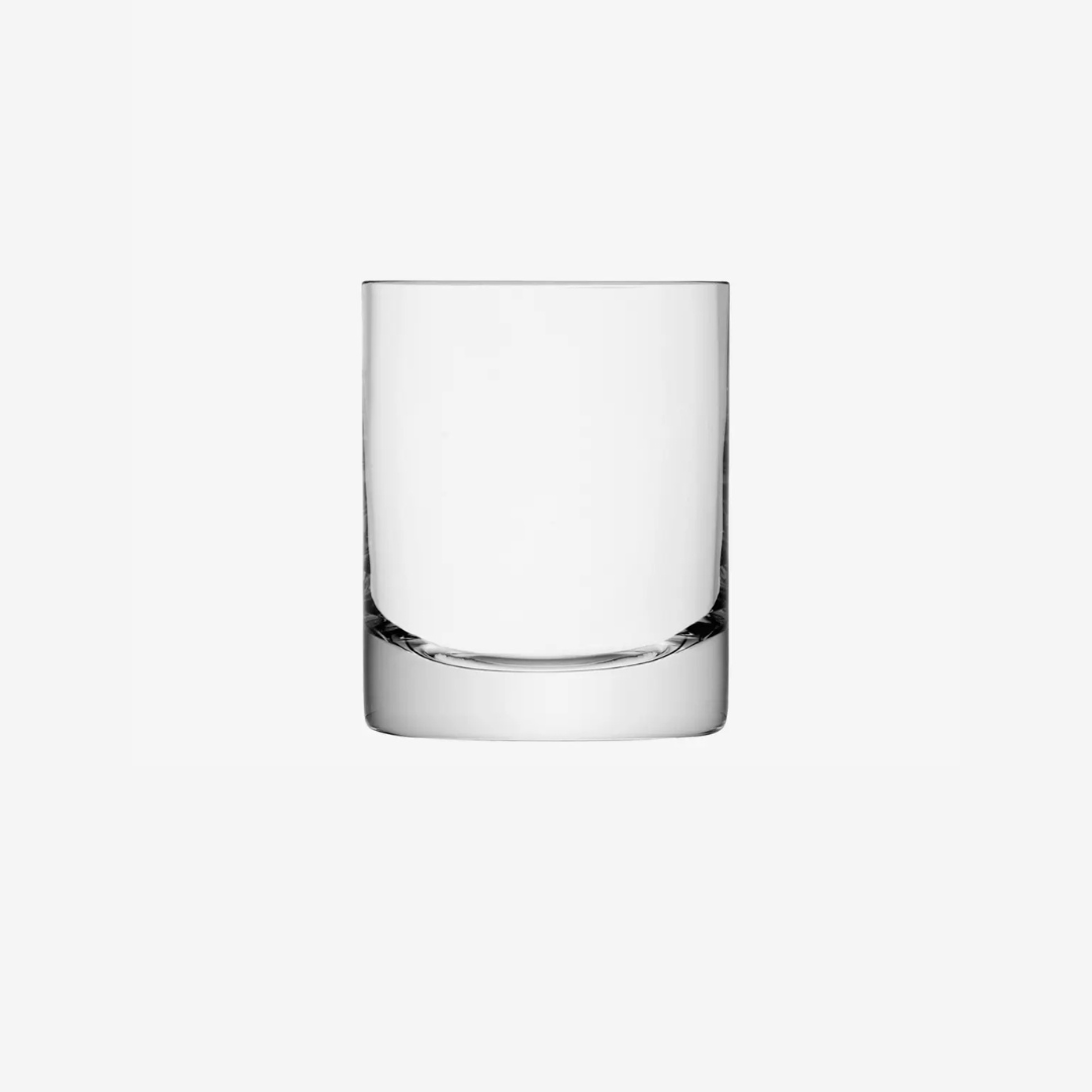 The LSA Bar Drinkware tumbler stands upright on a white background, showcasing its mouth-blown clear glass, smooth cylindrical shape, and thick solid base.