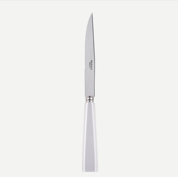 The Sabre Icone 5pps serrated butter knife features a white handle, stainless steel blade with SABRE PARIS engraving, and is dishwasher safe.
