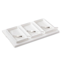 The Inspired Generations Bright White Brunch Board is a rectangular white tray featuring four compartments, each with a small metal knife or spatula sporting a clear handle—an ideal choice for organizing brunch essentials or serving in style at your next gathering.
