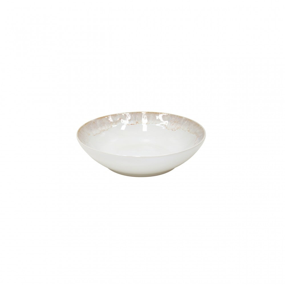 The Casafina Taormina Dinnerware White bowl is a shallow, round fine stoneware piece with a subtle beige and gray textured rim, shown here against a plain white background.