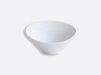 The Ecume White Dinnerware by Bernardaud features a white, cone-shaped bowl with a textured, dimpled rim, crafted from fine Limoges porcelain.