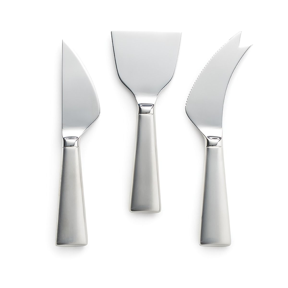 The Simon Pearce Hartland Cheese Knife Set features three silver stainless steel knives with wide handles—pointed, flat and wide, and curved with serrated edge and forked tip—elegantly arranged on a white background.