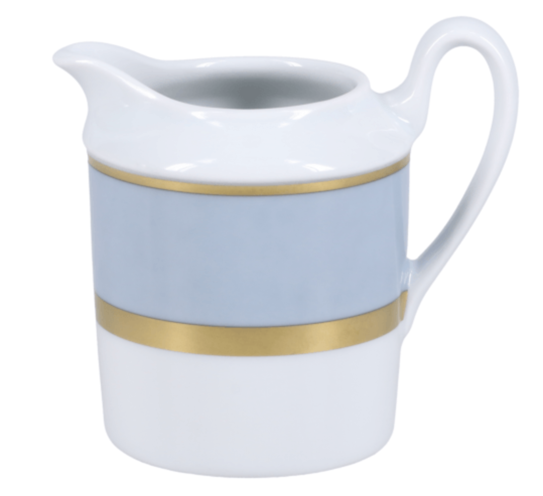 The Royal Limoges Recamier Grey & Gold Dinnerware pitcher is a white ceramic piece with a curved handle, highlighted by a wide grey band and slender gold accent, evoking classic French elegance.