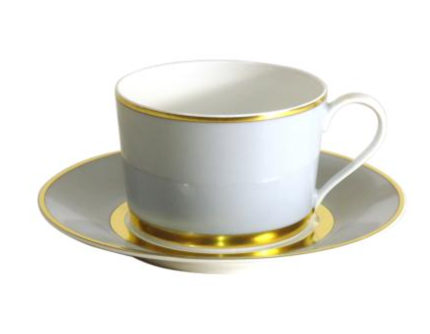 The Royal Limoges Recamier Grey & Gold teacup with handle sits on a matching saucer, both featuring gleaming gold trim. This elegant French-made set stands out beautifully against the plain white background.
