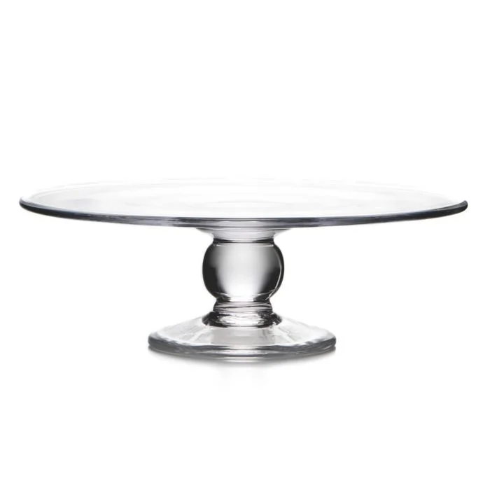 The Hartland Cakeplate by Simon Pearce features a flat, round top and sturdy, rounded pedestal base, expertly crafted by skilled glassblowers and shown against a white background.