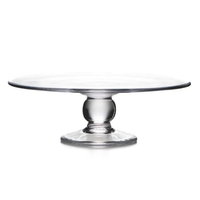 The Hartland Cakeplate by Simon Pearce features a flat, round top and sturdy, rounded pedestal base, expertly crafted by skilled glassblowers and shown against a white background.