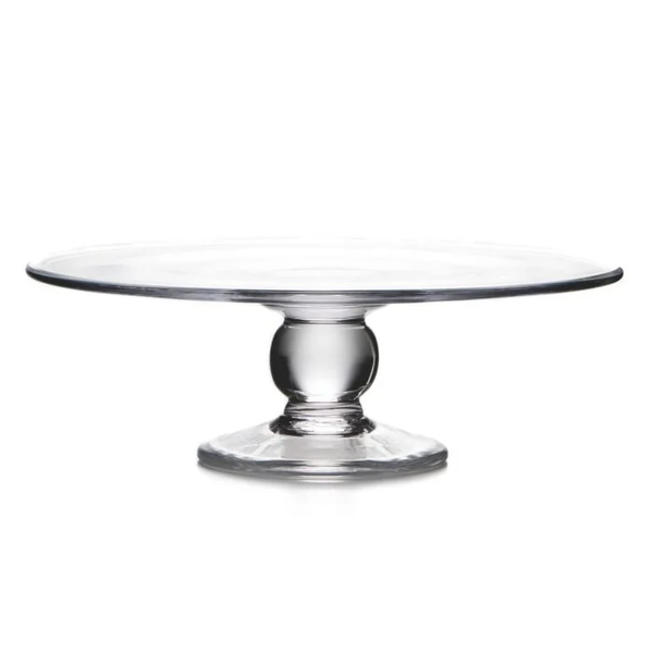 The Hartland Cakeplate by Simon Pearce features a flat, round top and sturdy, rounded pedestal base, expertly crafted by skilled glassblowers and shown against a white background.