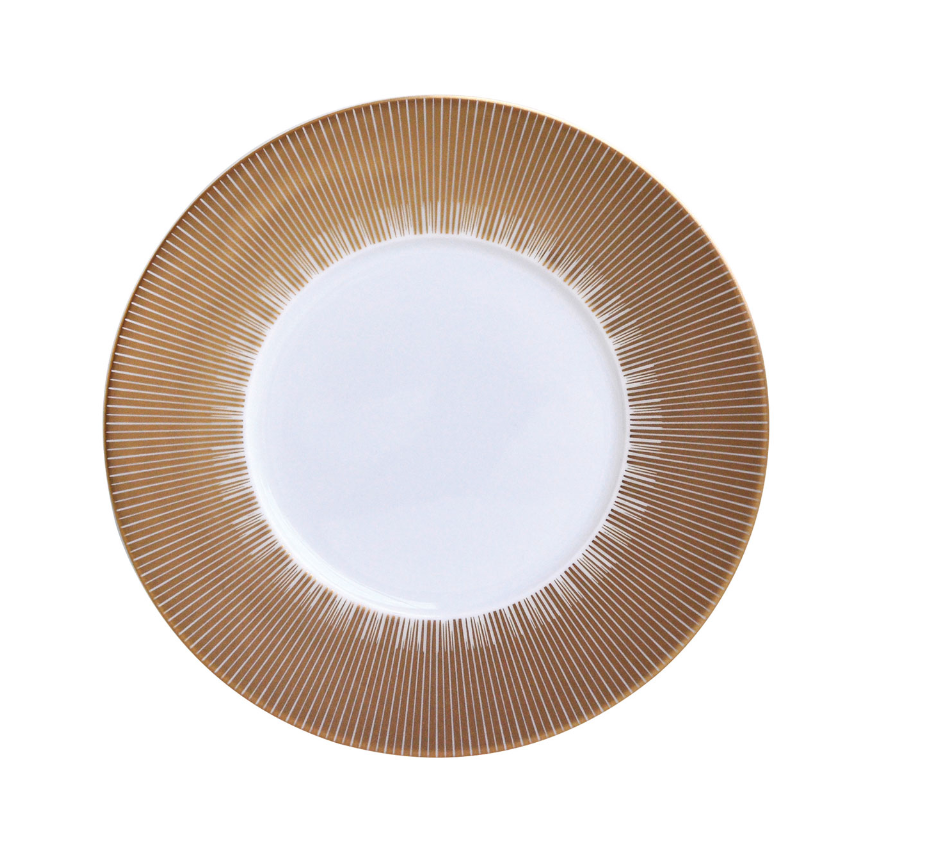 The Sol Dinnerware by Bernardaud is a white Limoges porcelain dinner plate with a wide gold rim adorned with thin, radiating lines, shown from above on a white background.
