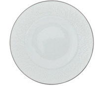 A round, white Limoges porcelain plate from Raynaud's Mineral Irise Dinnerware Platinum collection features a subtle textured rim and platinum detailing, viewed from above against a white background—an elegant dinnerware piece.