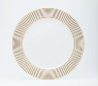 The Latitudes Dinnerware plate by Royal Limoges is a round, handmade Limoges porcelain plate with a wide rim decorated with thin beige concentric lines on white; its center remains elegantly plain and white.