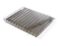 The Apeloig Striped Acrylic Challah Board & Knife | Various features a transparent, rectangular design with parallel grooves and an angled cutting guide for even slicing and a modern table accent.