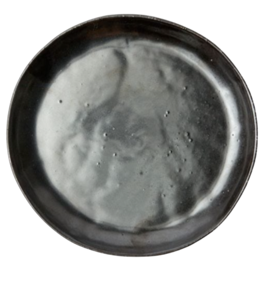 The Marcus Black Dinnerware Set of 4 by Blue Pheasant features round, dark grey stoneware plates with a glossy finish, organic silhouette, subtle uneven texture, and slightly raised rim, shown from above on a white background.
