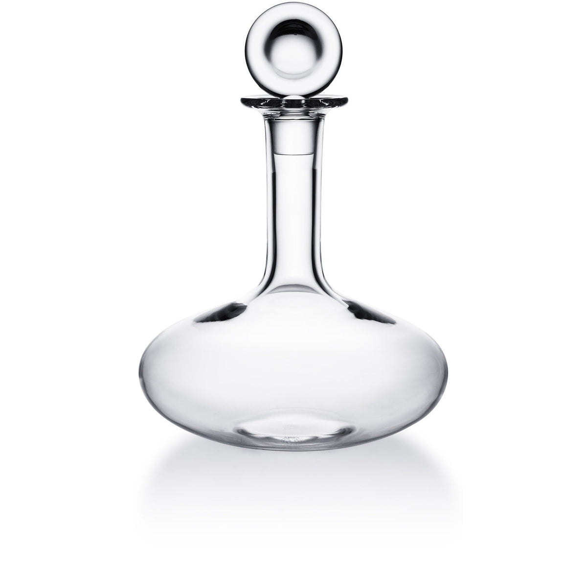 The Baccarat Oenologie Decanter by Baccarat, with its clear crystal design, round stopper, wide base, and narrow neck, is displayed against a plain white background.