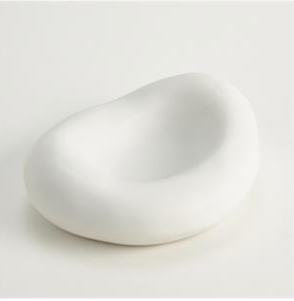 The Balloon Bowl White by Global Views/Surya is a smooth, pebble-shaped ceramic bowl with a matte white finish and a shallow rounded center, shown on a plain white background.