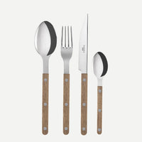 The Sabre Bistro Flatware 5 Piece Setting - Teak features stainless steel utensils with teak handles—a large spoon, fork, knife, small spoon, and dessert fork—displayed side by side on a plain white background.