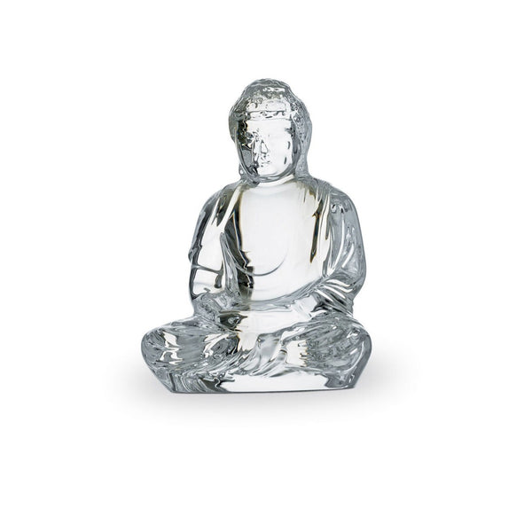 The Baccarat Little Crystal Buddha by Baccarat is a lead crystal glass sculpture depicting a seated Buddha in meditation, with crossed legs and one hand on the lap, symbolizing spiritual awakening, set against a white background.