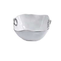 The PAMPA BAY Handle Bowl Silver Trim is a white, square porcelain bowl with gently curved sides and two metallic handles, displayed on a plain white background.