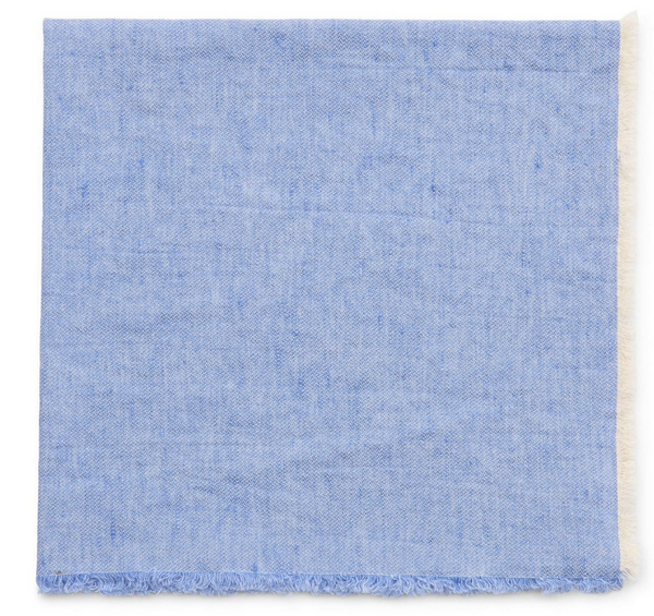 The Deborah Rhodes Woven Washed Fringe Napkin Colony Blue Set of 4 features slightly textured, neatly folded linen-cotton napkins with a prewashed fringe along the bottom edge.