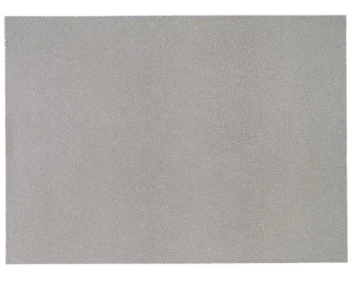 The Bodrum Skate Rectangle Placemat Set of 4 features plain gray fabric with a subtle, fine texture—offering a simple and elegant touch for your dining table.