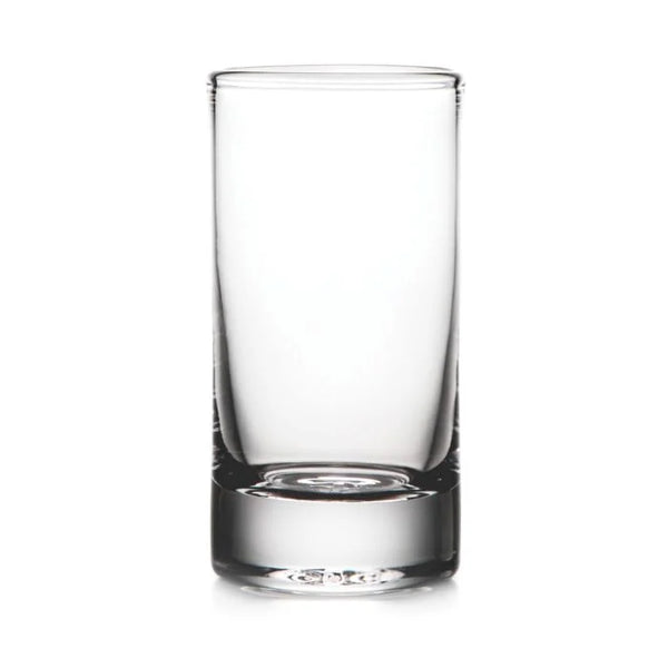 The Simon Pearce Ascutney Highball glass tumbler stands upright on a white background, featuring a thick base and smooth sides.
