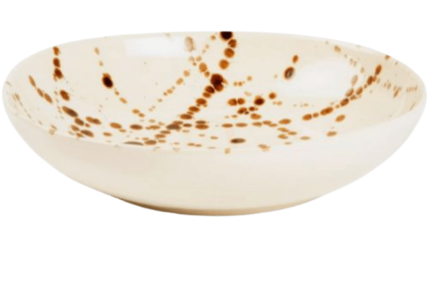 The Delaney Bronze Splatter Dinnerware by Blue Pheasant features a shallow, cream ceramic bowl with bronze splatter and brown swirl accents—an elegant handmade stoneware piece to elevate any collection.