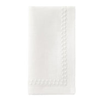 The Bodrum Pearls Napkin White Set of 4 features finely folded linen napkins with embroidered edges and small decorative dots along two sides, shown on a plain white background.
