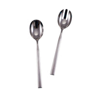 The Simon Pearce Hartland 2 Piece Serving Set features modern, dishwasher safe stainless steel salad servers—a solid spoon and slotted fork—perfect for stylish entertaining. Shown on a white background.