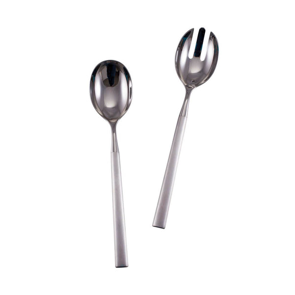 The Simon Pearce Hartland 2 Piece Serving Set features modern, dishwasher safe stainless steel salad servers—a solid spoon and slotted fork—perfect for stylish entertaining. Shown on a white background.