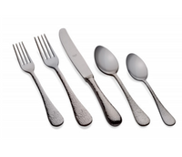 The Epoque Oro Nero Flatware 5 Piece Setting by Mepra features two forks, one knife, one soup spoon, and one teaspoon in hammered stainless steel, displayed in a row on a white background.