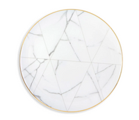 The Carrara by Coline Le Corréa Dinnerware plate from Vista Alegre is a round white porcelain piece with a gold rim, decorated with a geometric pattern of gray marble-like lines forming triangles across the surface.