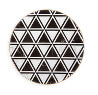 The Carrara by Coline Le Corréa Dinnerware plate from Vista Alegre features a round porcelain shape, a black and white geometric hexagon pattern, and a thin gold rim for an elegant designer touch.