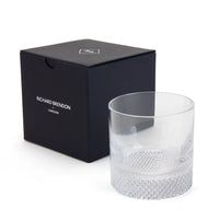 The Diamond DOF Old Fashioned glass by Richard Brendon sits beside its signature navy blue gift box.