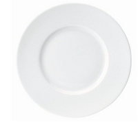 The Seychelles Dinnerware by Philippe Deshoulieres features a plain white, round porcelain plate with a subtly textured rim, displayed from above against a white background.
