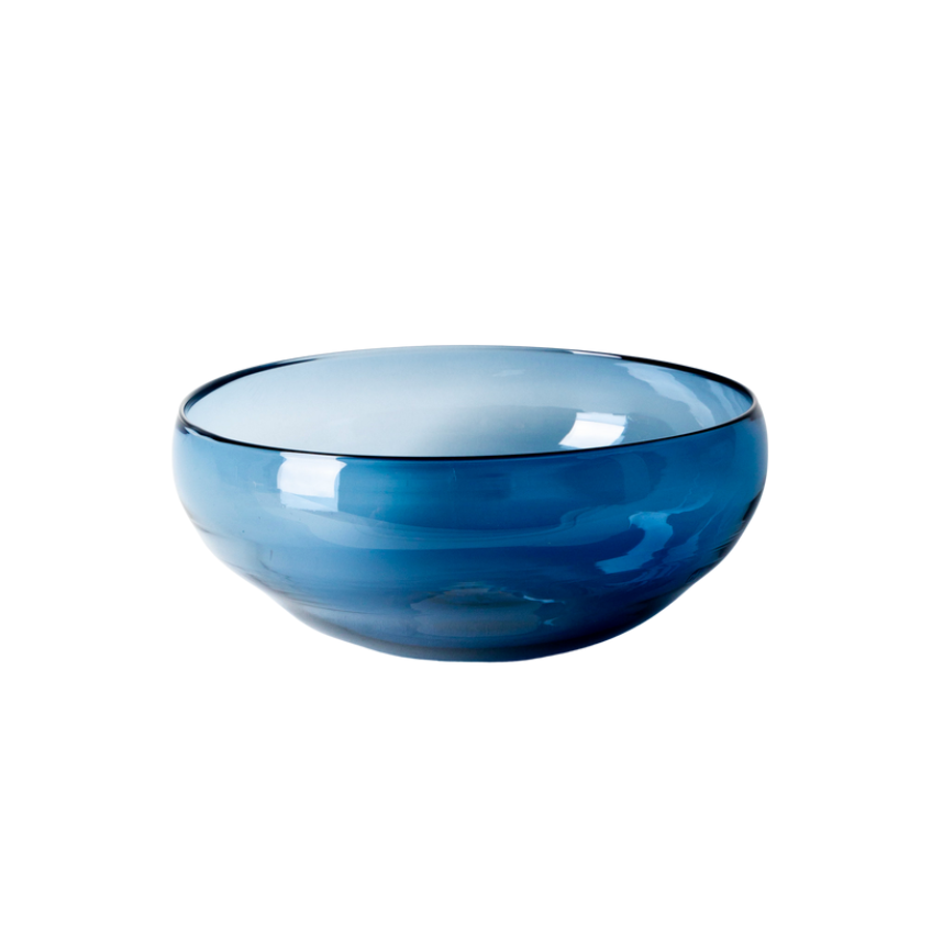 The Gary Bodker Nesting Bowls Midnight is a round, shallow blue glass bowl with a smooth, glossy finish, adding handcrafted elegance to your table and standing out beautifully against a white background.
