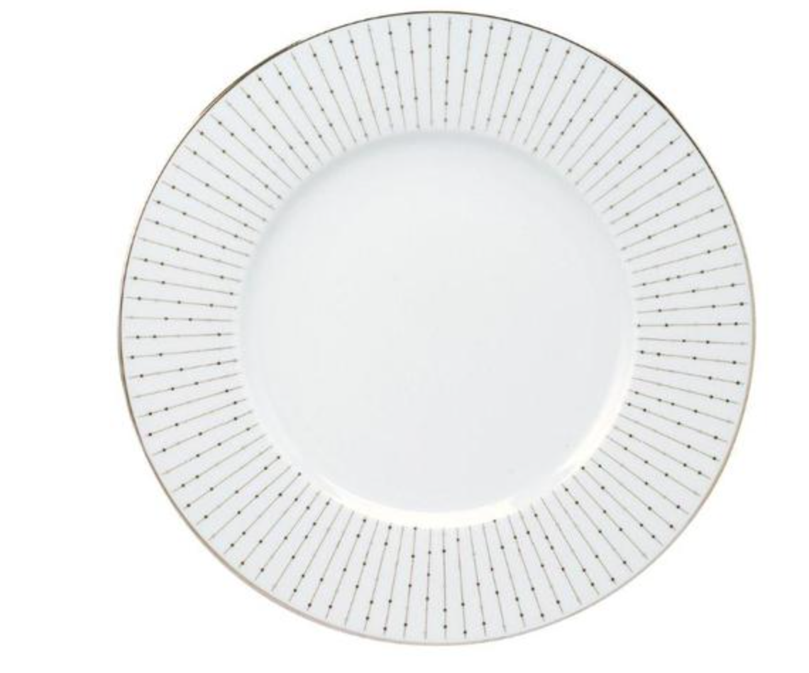 The Carrousel Dinnerware by Philippe Deshoulieres features a white Limoges porcelain plate adorned with a gold rim and fine gold lines radiating from the center, each line accented by delicate gold dots.