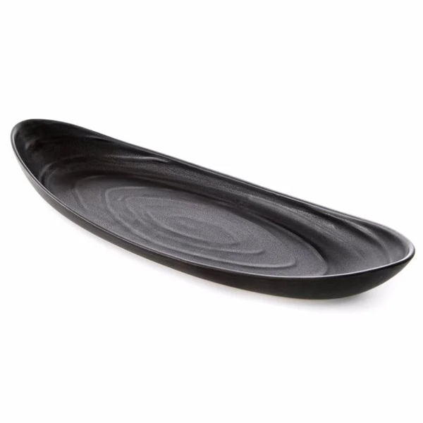 The Simon Pearce Barre Serving Platter in Slate is a long, oval stoneware piece with a smooth, slightly textured black finish, shown on a white background.