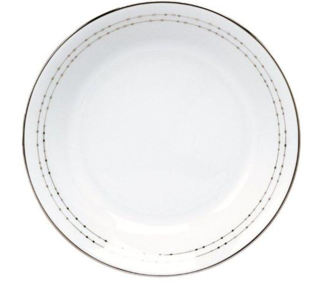 The Carrousel Dinnerware dinner plate by Philippe Deshoulieres features white Limoges porcelain with a subtle silver and gold dotted rim, shown from above on a white background.