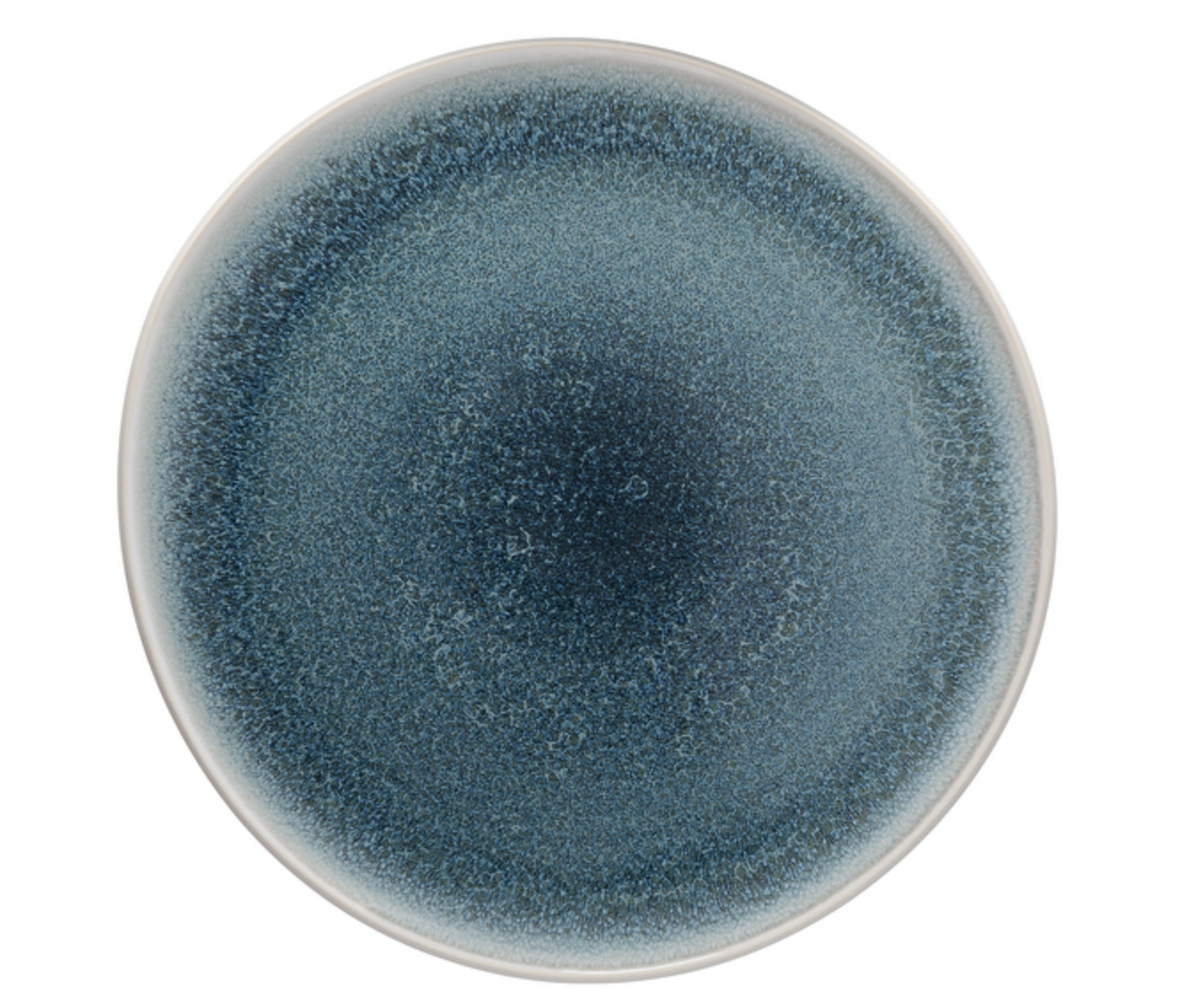The Rosenthal Junto Aquamarine Dinnerware plate features textured stoneware with a blue gradient reactive glaze—dark at the center, lighter at the edge, and a slim white rim. Dishwasher and microwave safe for everyday use.