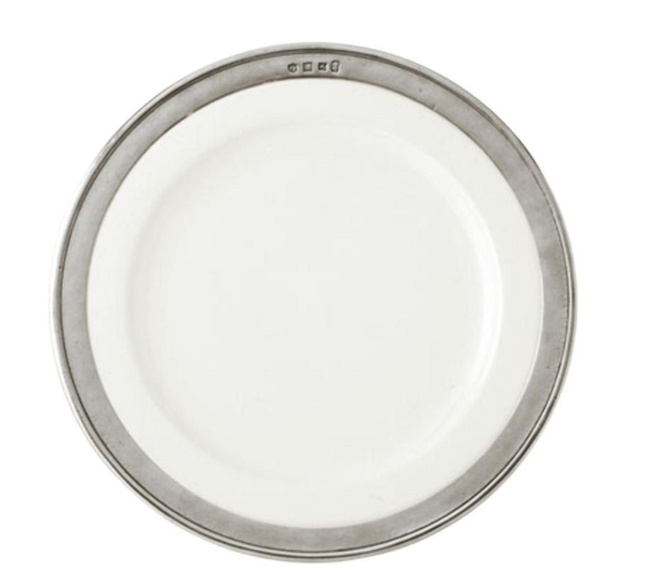 A round, white ceramic MATCH Convivio plate by MATCH, featuring a wide pewter rim and small top engravings, from the Convivio Dinnerware collection. Photographed on a white background.