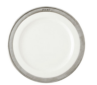 A round, white ceramic MATCH Convivio plate by MATCH, featuring a wide pewter rim and small top engravings, from the Convivio Dinnerware collection. Photographed on a white background.